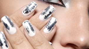 Beautiful girl with the silver makeup and  metal nails. Fashion woman portrait.