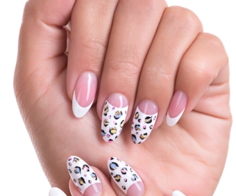 Beautiful woman's nails with beautiful french manicure